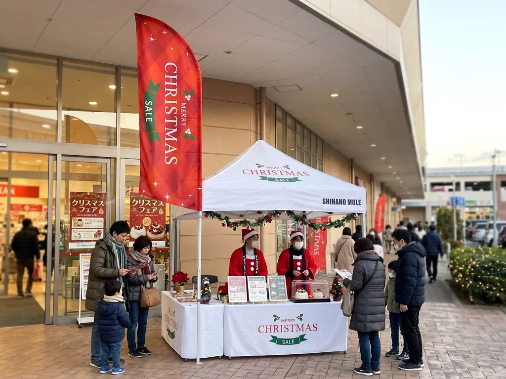店頭にワンタッチテントを設営したクリスマスケーキ販売ブースの例